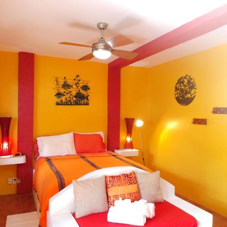 Seaside Cabanas Hotel Caye Corker Exterior photo
