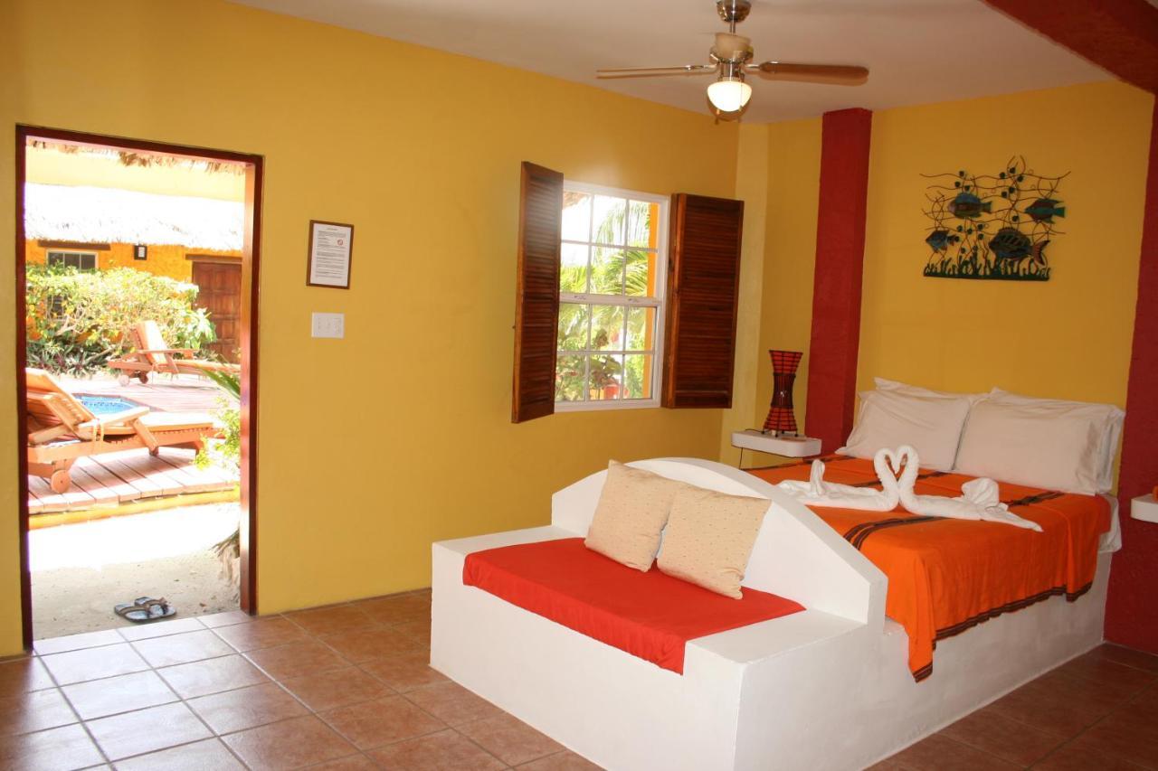 Seaside Cabanas Hotel Caye Corker Exterior photo