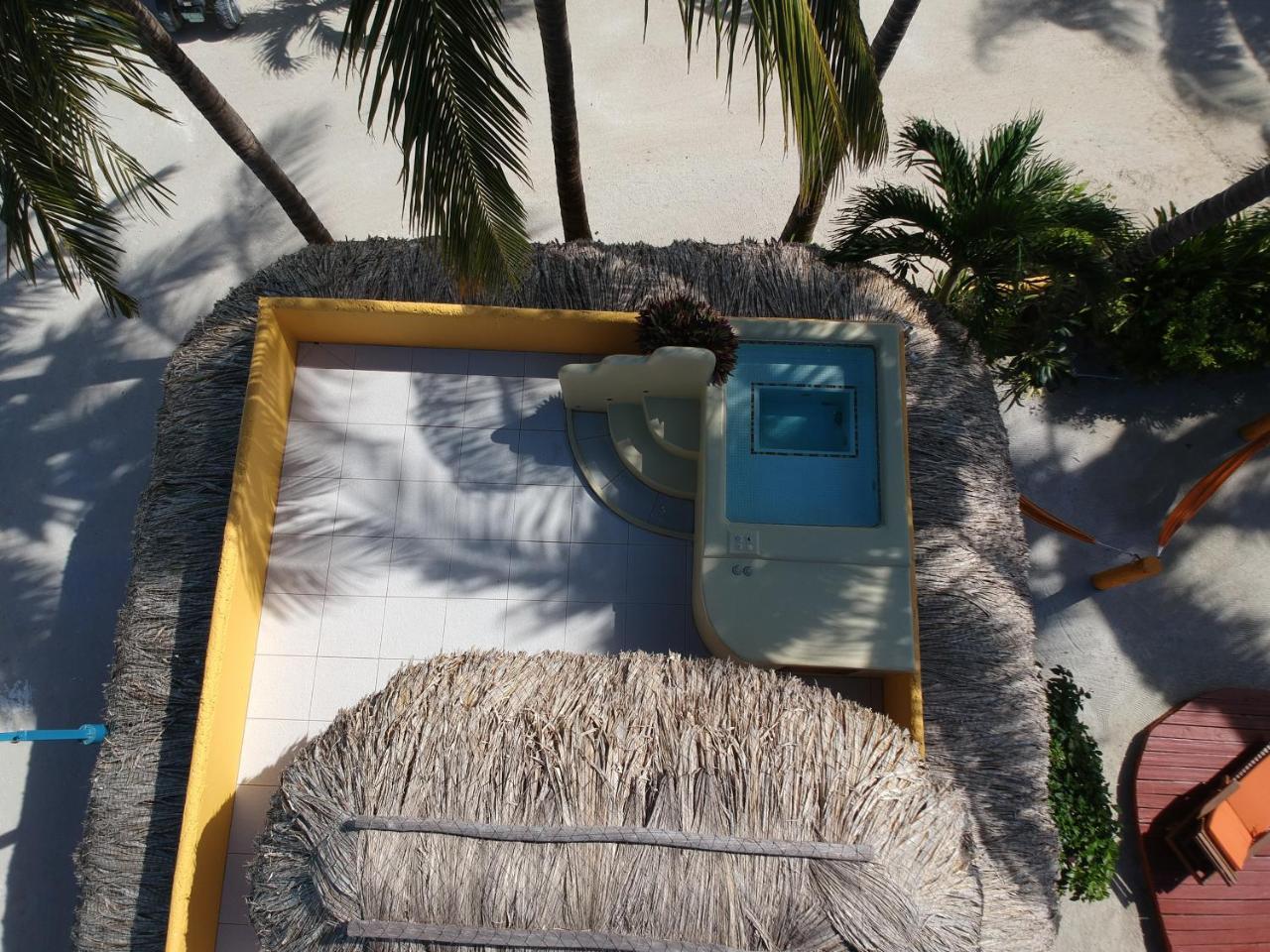 Seaside Cabanas Hotel Caye Corker Exterior photo