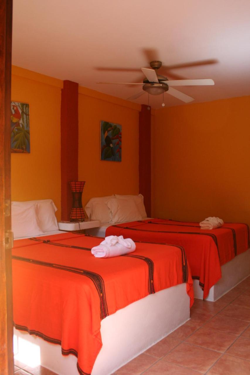 Seaside Cabanas Hotel Caye Corker Exterior photo